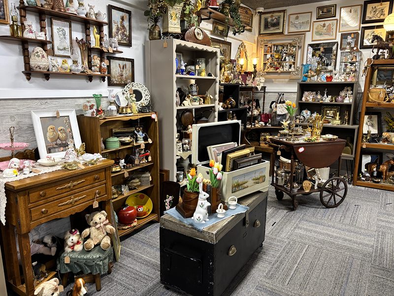Framed prints, teddy bears, a wooden tea cart and small furniture